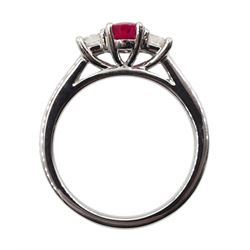 Platinum three stone oval ruby and round brilliant cut diamond ring, hallmarked, ruby approx 1.00 carat, total diamond weight approx 0.30 carat