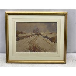 Frederick (Fred) Lawson (British 1888-1968): 'A Wensleydale Lane in Winter', watercolour signed, titled on gallery label verso 27cm x 37cm 
Provenance: with Chris Beetles Gallery, London, label verso
