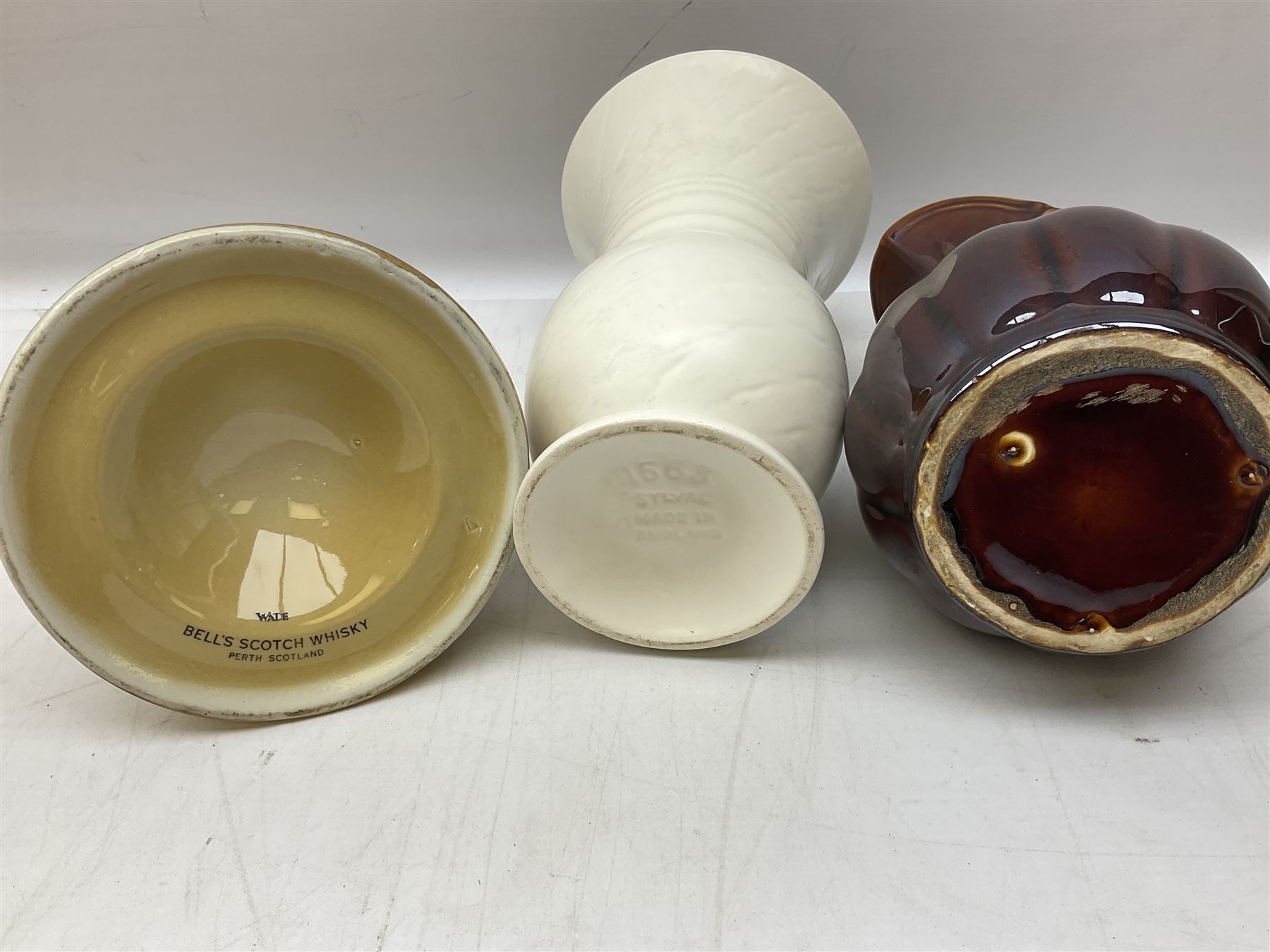 Grimwades Byzanta ware bowl in the Watteau pattern, D41.5cm, together with Sylvac vase, Bell's Whisky decanter, Denby stoneware teapot etc