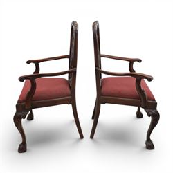 Chippendale design set of ten (8+2) mahogany dining chairs, serpentine cresting rails with carved detail over pierced ribbon-tied splats, red damask upholstered drop-in seats, on cabriole supports with acanthus carved knees and claw and ball feet