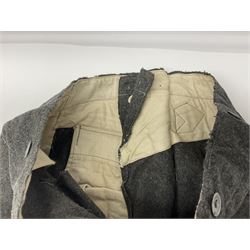 Pair of WW2 German Other Ranks trousers c1940-42, stamped C.& A. Brenninkmeyer Workstatten; WW2 German Army webbing belt with steel 'Gott Mit Uns' buckle; and WW2 German leather belt with 'Stahlhelm' (Steel Helmet League) members buckle (3)