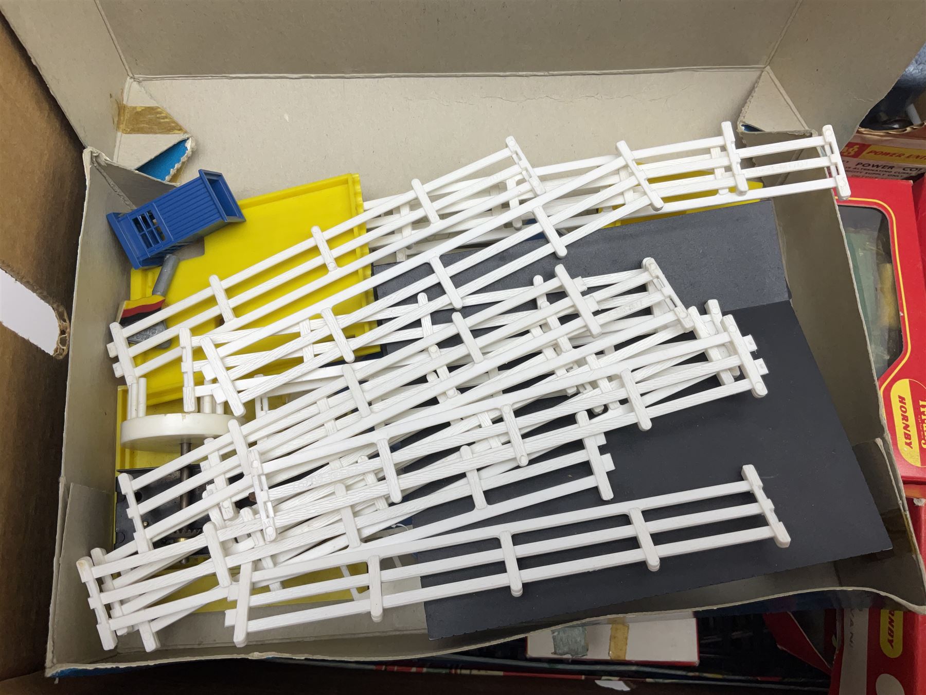 Tri-ang - quantity of '00' gauge model railway and Minic Motorways slot-racing items including Class B12 4-6-0 locomotive No.61572; boxed; seven goods wagons in five boxes; R576 Tunnel and Island Platform Set; both boxed; quantity of track and power unit; four Minic Cars and two controllers; boxed Customs Barrier and Frontier Post Set; railway car transporter and car loading ramp; quantity of track and trackside accessories; and boxed Car-Play Filling Station Set