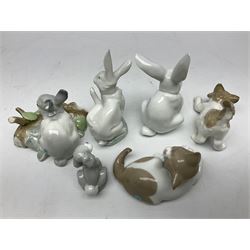 Six Lladro figures, comprising A Friend for Life no 7685, Rabbit Eating no 4773, Sitting Bunny no 5907, Washing up no 5887, Surprised cat no 5114 and Scar-dy Cat no 5092, all with original boxes, largest example H15cm 