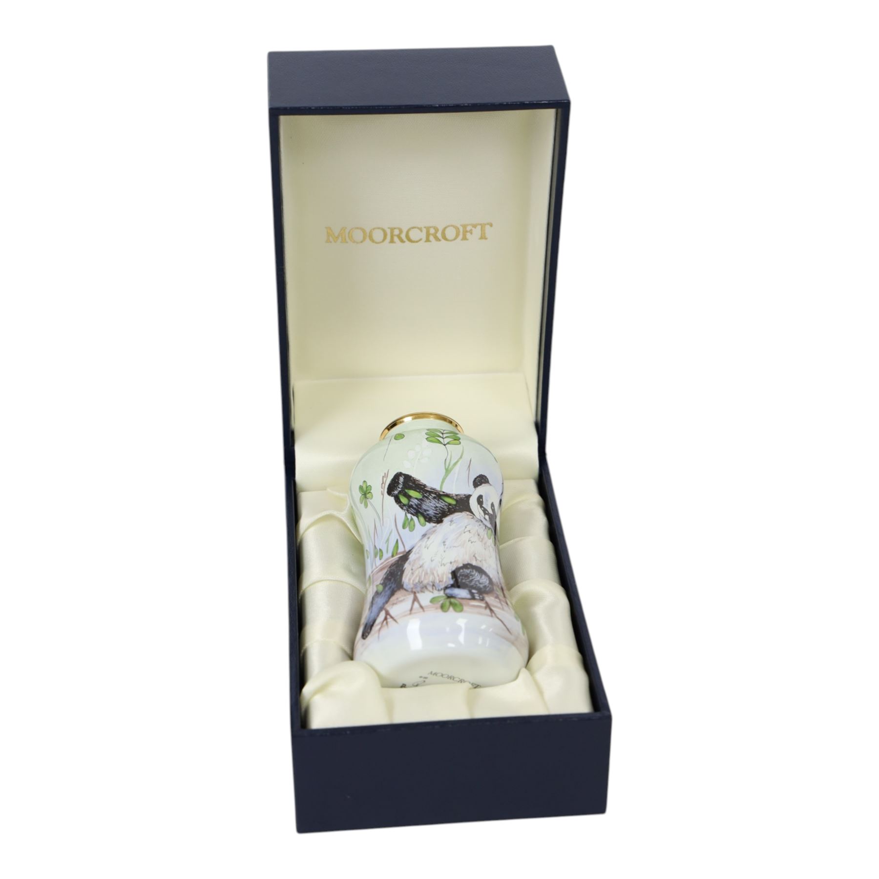 Moorcroft enamel vase, decorated with pandas, in box together with a small Moorcroft vase clematis pattern, enamel vase H8cm