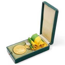 Sweden - Gustaf V gold medal for Long Term and Faithful Service awarded to Emil Pettersson the rim marked 'Guld 1945' with green and yellow ribbon in original box