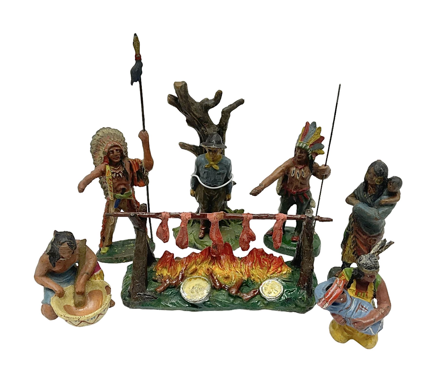Five Elastolin American Indian figures, together with an Elastolin campfire and a cowboy tied to a tree, tallest H11cm