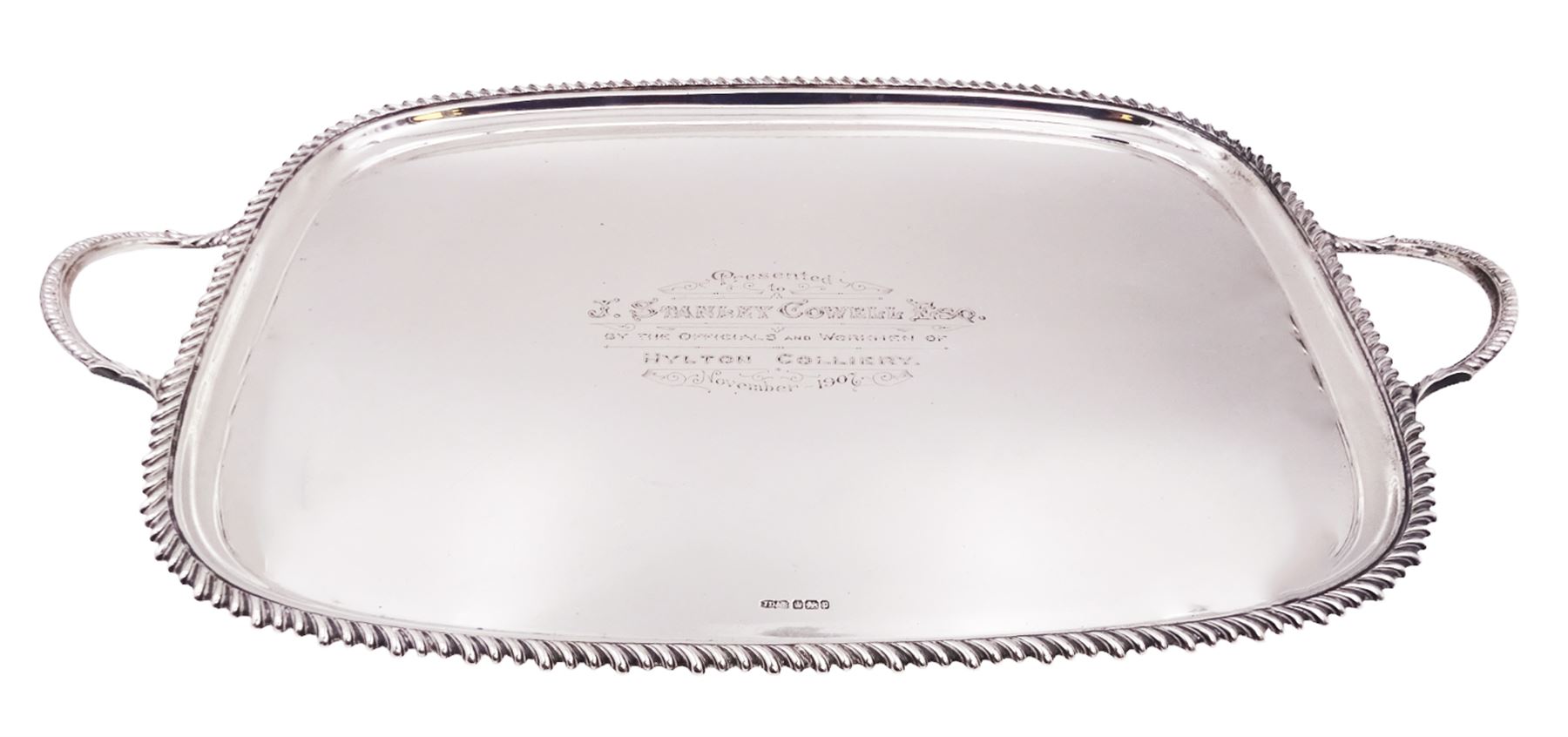 Edwardian silver twin handled tray, with oblique gadrooned rim and presentation engraving to the centre, hallmarked James Dixon & Sons Ltd, Sheffield 1907, not including handles W46cm