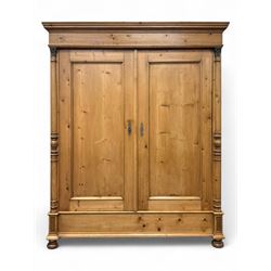 Large 19th-century Continental polished pine double wardrobe, panelled back and doors reve...