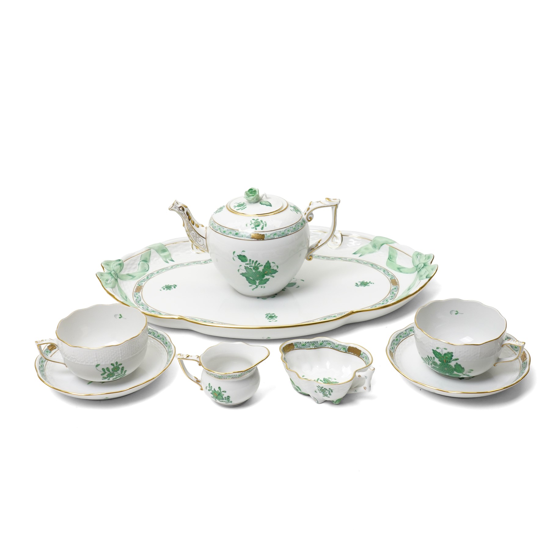 Herend porcelain Tete a Tete decorated in the green Chinese Bouquet pattern, comprising cabaret tray, two cups and saucers, tea pot, leaf shape bowl and milk jug
