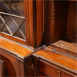 Large Georgian mahogany library bookcase, projecting moulded cornice with row of globular mounts, adjustable shelving enclosed by six astragal glazed doors, fitted with two slides and six panelled cupboard doors, two banks of five drawers, on moulded plinth base; together with two pairs of associated astragal glazed doors in mahogany, from the same property (W55.5cm x H168cm & W48cm x 168cm)