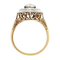 19th century 18ct gold and silver diamond marquise shaped cluster ring, the principal old cut cushion cut diamond of 1.15 carat, in a six claw setting, with pave set old cut diamond surround of 3.28 carat, pierced scroll design gallery and fleur-de-lis shoulders, French (Paris) import mark, total diamond weight 4.43 carat, with IGI report