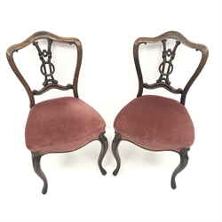  Pair Victorian rosewood bedroom chairs, shaped cresting rail, carved and pierced splat, upholstered serpentine seat, cabriole legs, W46cm  