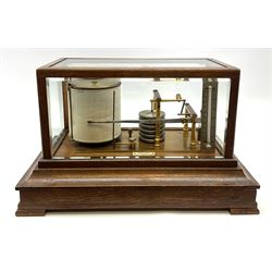 Edwardian oak cased barograph labelled 'Benn Franks Optician Hull Hanley etc' with lacquered brass mechanism, six bellow aneroid tower, silvered thermometer, clockwork drum and fitted ink bottle, lift-off cover with five bevelled glass panels on stepped base with chart drawer and bracket feet W37cm