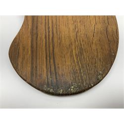 Mouseman - oak kidney-shaped cheeseboard, the handle caved with mouse signature, by the workshop of Robert Thompson, Kilburn 