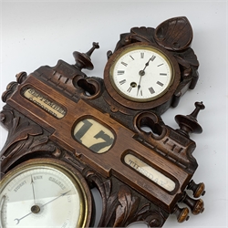 A late 19th century oak wall hanging combination clock, barometer and perpetual calendar, the 8.5cm white enamel dial with Roman numerals, above rolling dates, and a barometer with curved thermometer, the shaped case carved with stylised acanthus leaves and shield, H52cm. 
