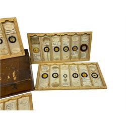 19th century and later, thirty-six microscope slides, to include entomology and plant specimens; cased    