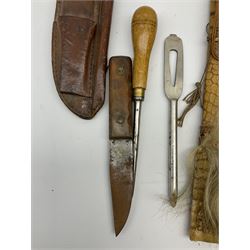 Leather belt sheath for an Ibberson yachting kit containing associated marline spike and shackle key, seaman's hardwood handled knife and wooden handled marline spike L25cm; and machete style long knife, the 28cm steel fullered blade marked Lindner & Co. Warranted, split horn grip and reptile skin scabbard (2)