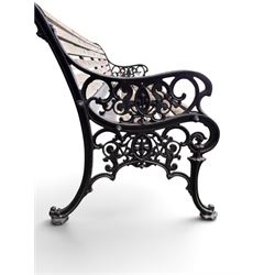 Victorian Andrew McLaren pattern cast iron bench, the ornate ends with detailed scrollwork, joined together with a cast iron seat and backrest frame supporting gently weathered oak slats, Victorian diamond stamp mark