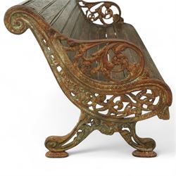 19th century oak and cast iron garden bench, shaped back and seat formed from curved wooden slats secured with dome rivets, pierced cast iron supports with foliate decoration 