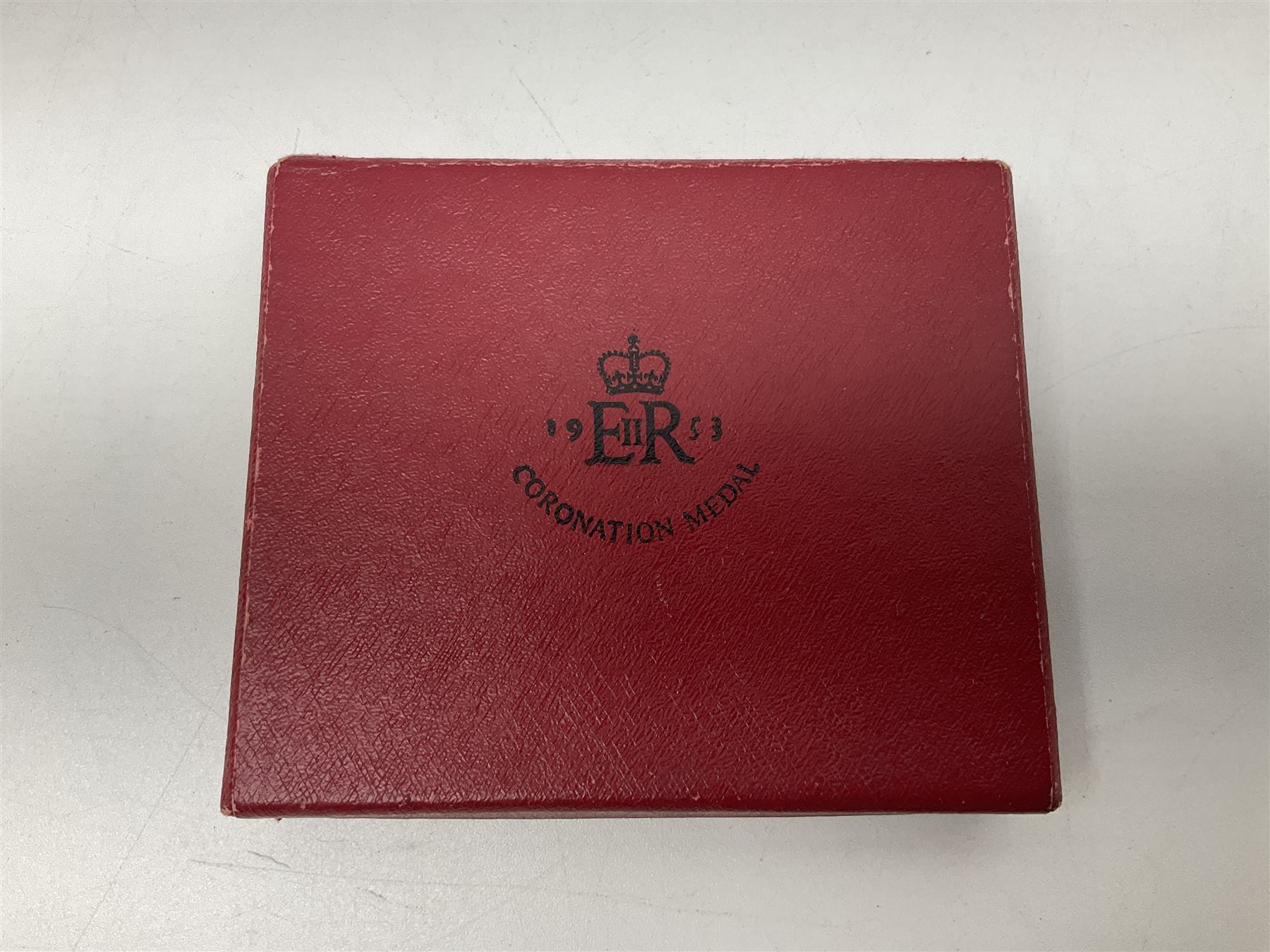 Commemorative medallions or medals including three Queen Victoria Diamond Jubilee small silver medallions, two King Edward VII 1902 Coronation medallions and a Queen Elizabeth II 1953 Coronation medal in red box