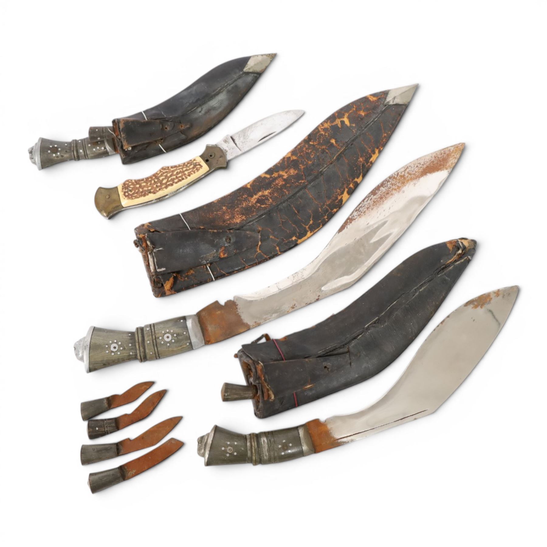 Gurka Kukri, together with two smaller examples and a Japnese folding knife 