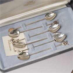 Set of six Australian silver coffee spoons each with a different terminal including Koala, Emu etc, Melbourne mint, cased and a set of six silver handles pastry knives, cased