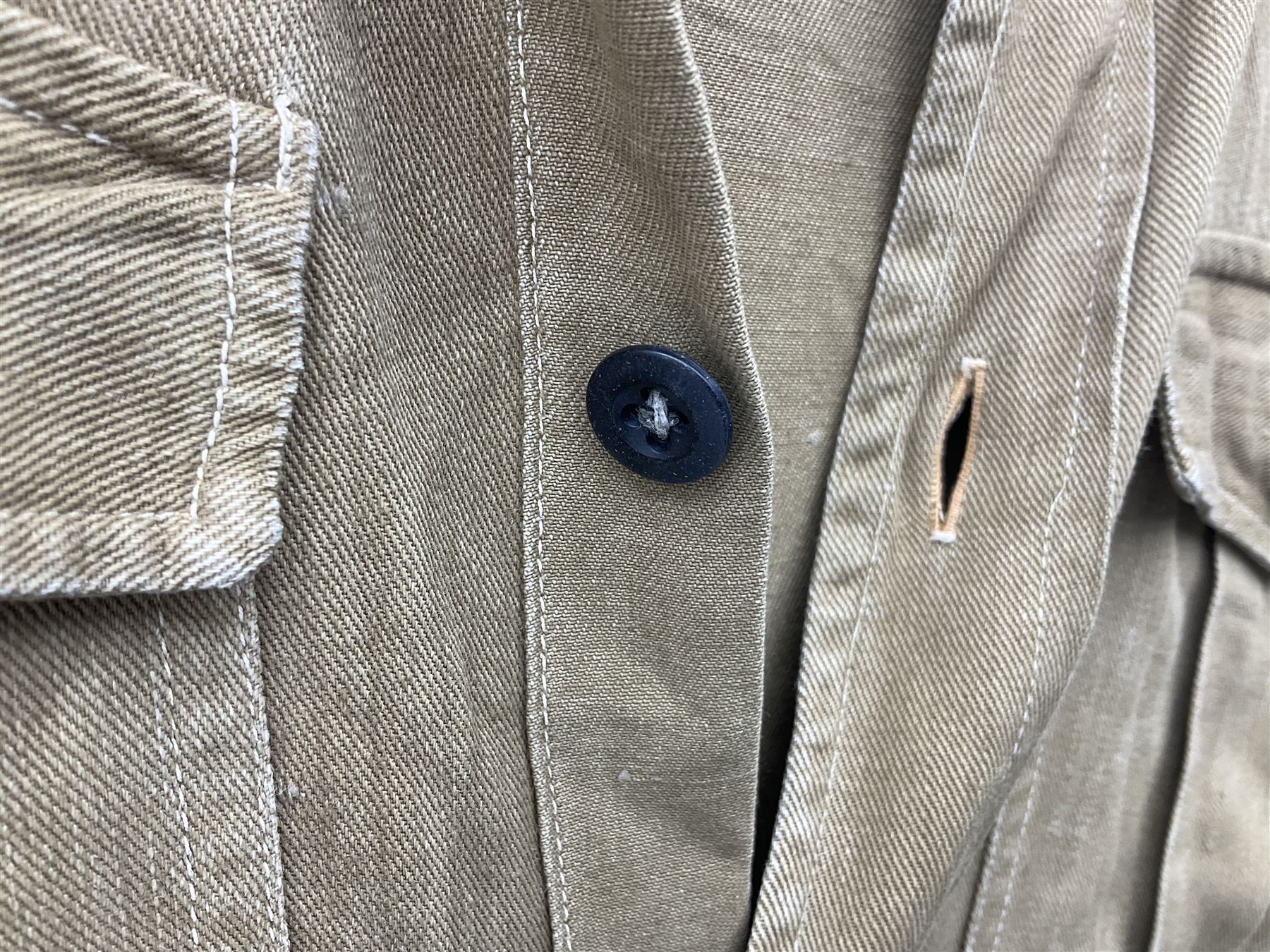 1930s Hitler Youth brown shirt, long length with two pockets, bears triangular badge 'Nord Nordsee'