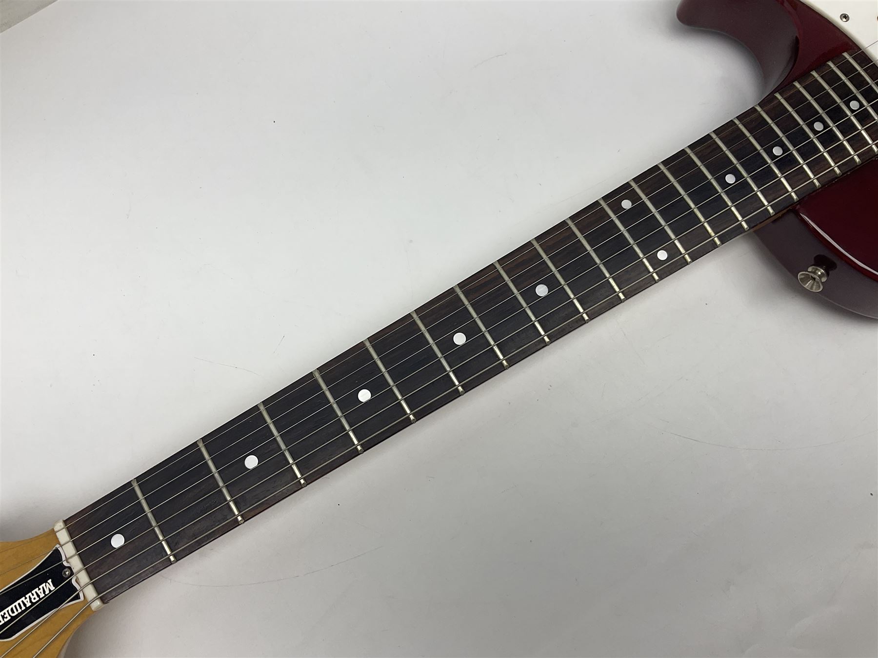 Gibson Marauder style six-string electric guitar with cherry coloured body, marked made in Japan L101cm; in locking hard carrying case