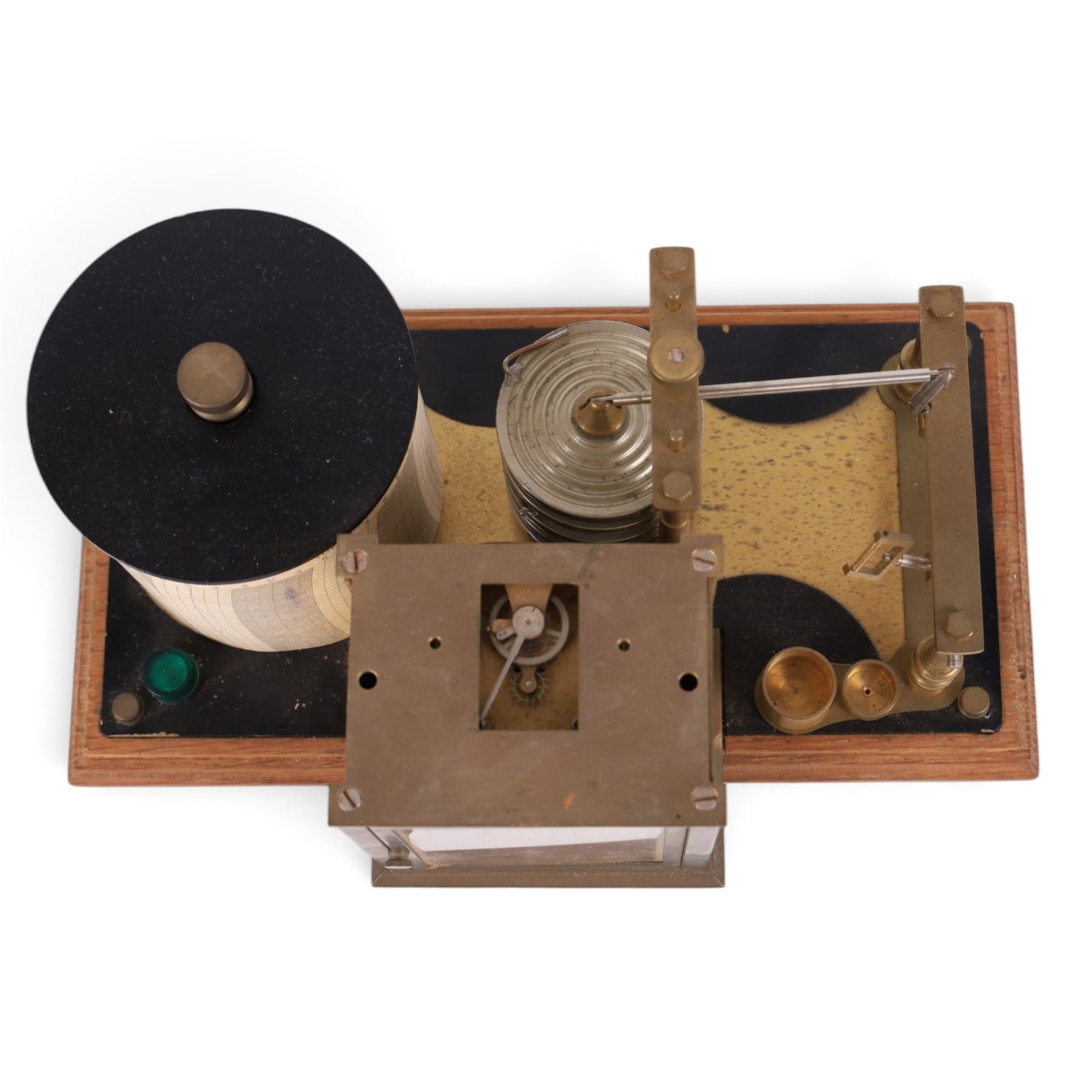 Brass barograph with integral brass clock, upon a wooden wooden plinth