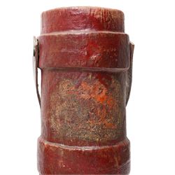 British military leather cordite shot carrier with coat of arms H52cm, Zuckerman Civil Defence helmet with liner and inscribed H.F.P. (Head of Fire Party),  and two gas masks
