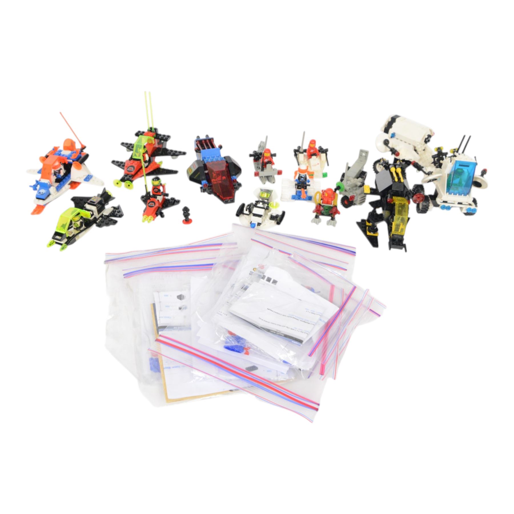 Twelve vintage Lego spaceships, comprising no. 6877-1 Vector Detector, no. 6814-1 Ice Tunnelator, no.6811-1 Pulsar Charger, no. 6870-1 Space Probe Launcher, no. 6815-1 Hovertron, no. 6876 Alienator, no. 6886-1 Galactic Peace Keeper, no. 6806-1 Surface Hopper, no. 6879-1 Blizzard Baron, no. 6822-1 Space Digger, no. 6832-1 Super Nova II and no. 6925 Interplanetary Rover, all built with minifigures