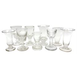 Group of 18th/19th century drinking glasses, to include a jelly glass with trumpet bowl, gadrooned collar and spreading circular foot, H11cm, firing glass with rounded funnel bowl with engraved and faceted border, upon a plain stem and thick firing foot, H9.5cm, further firing glass with the funnel bowl, upon a flanged firing foot, H8cm, etc. 