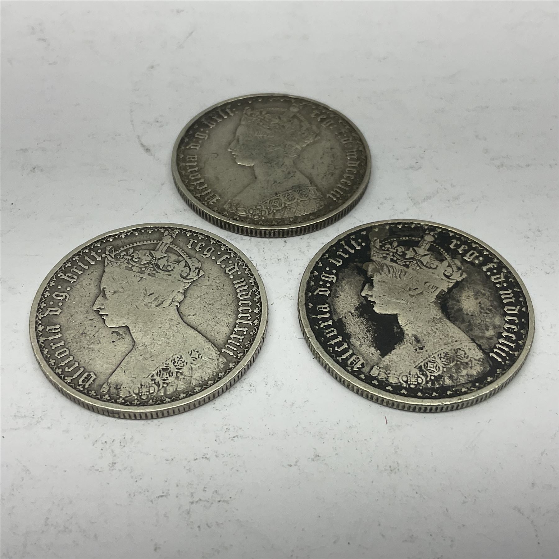 Three Queen Victoria silver 'Gothic' florin coins, dated two 1853 and 1873