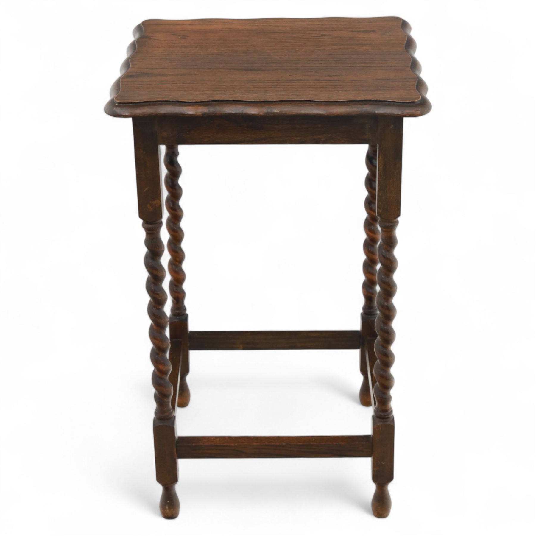 Early 20th century mahogany side table; with bedside cabinet, shaped rectangular top on barley twist supports united by stretchers (H 72cm, W 42cm, D 45cm), together with a Late Victorian tiger bamboo occasional table, rectangular two-tier form with woven cane surfaces, the upper tier with raised edge above splayed supports with naturalistic jointing (H 70cm, W 52cm, D 36cm)