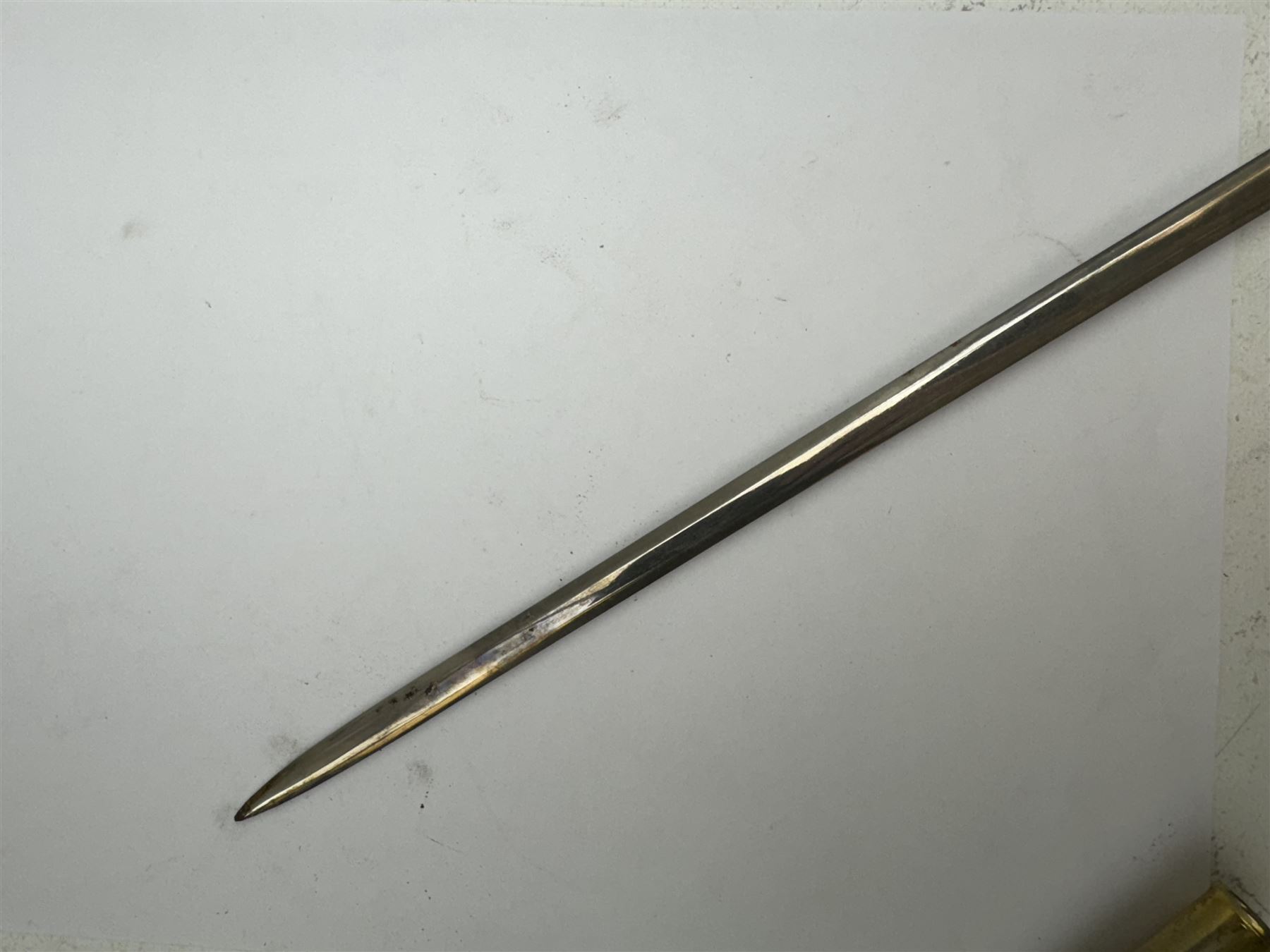 Ceremonial sword, the 75cm blade marked Toledo, Spain, gilt handle with black wire-bound grip  with leather scabbard with gilt tip, L94cm 
