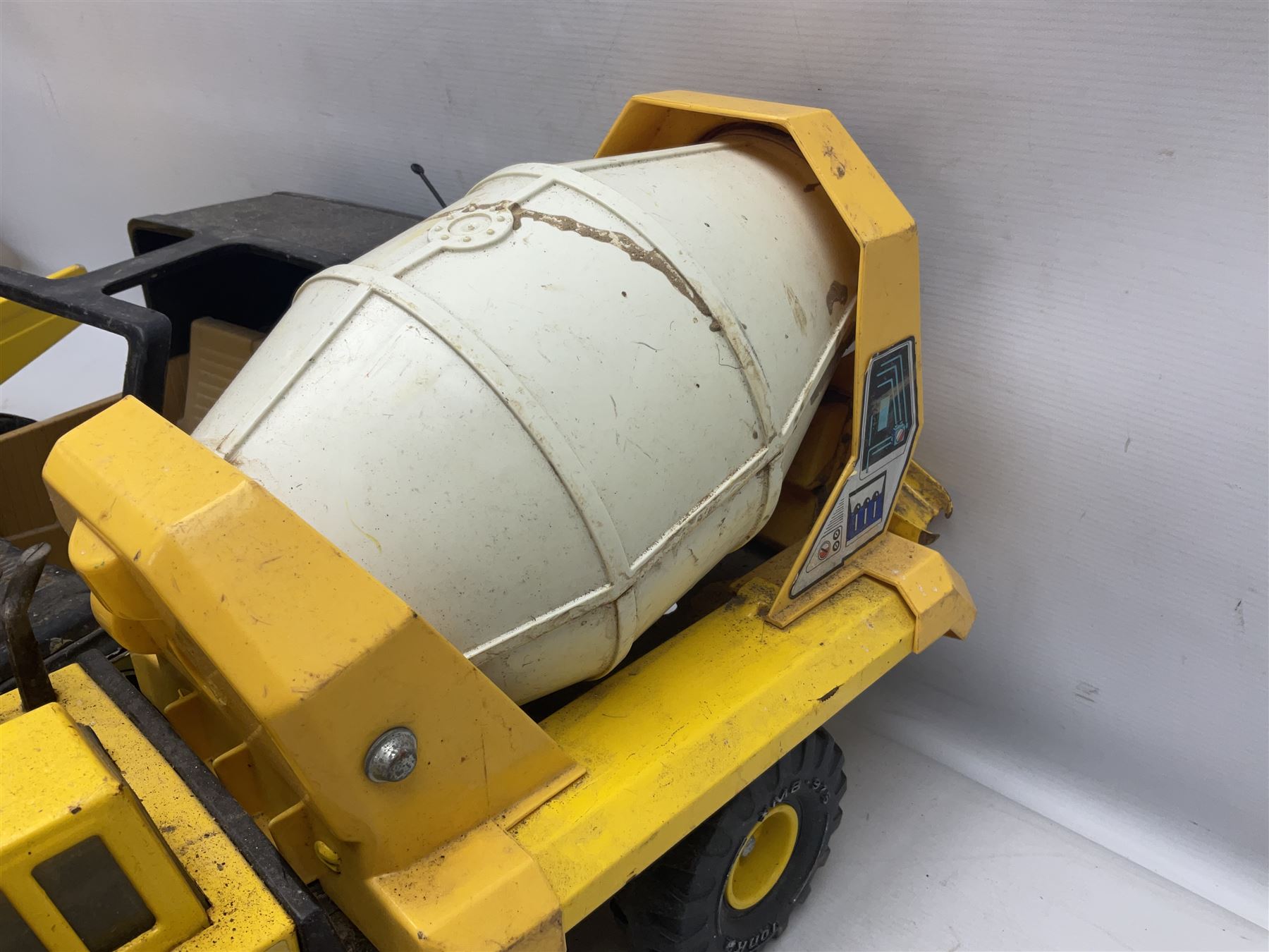Tonka - five large scale pressed steel vehicles comprising Cement Mixer, Mighty Mobile Crane, Jeep and two Dumper Trucks (5)