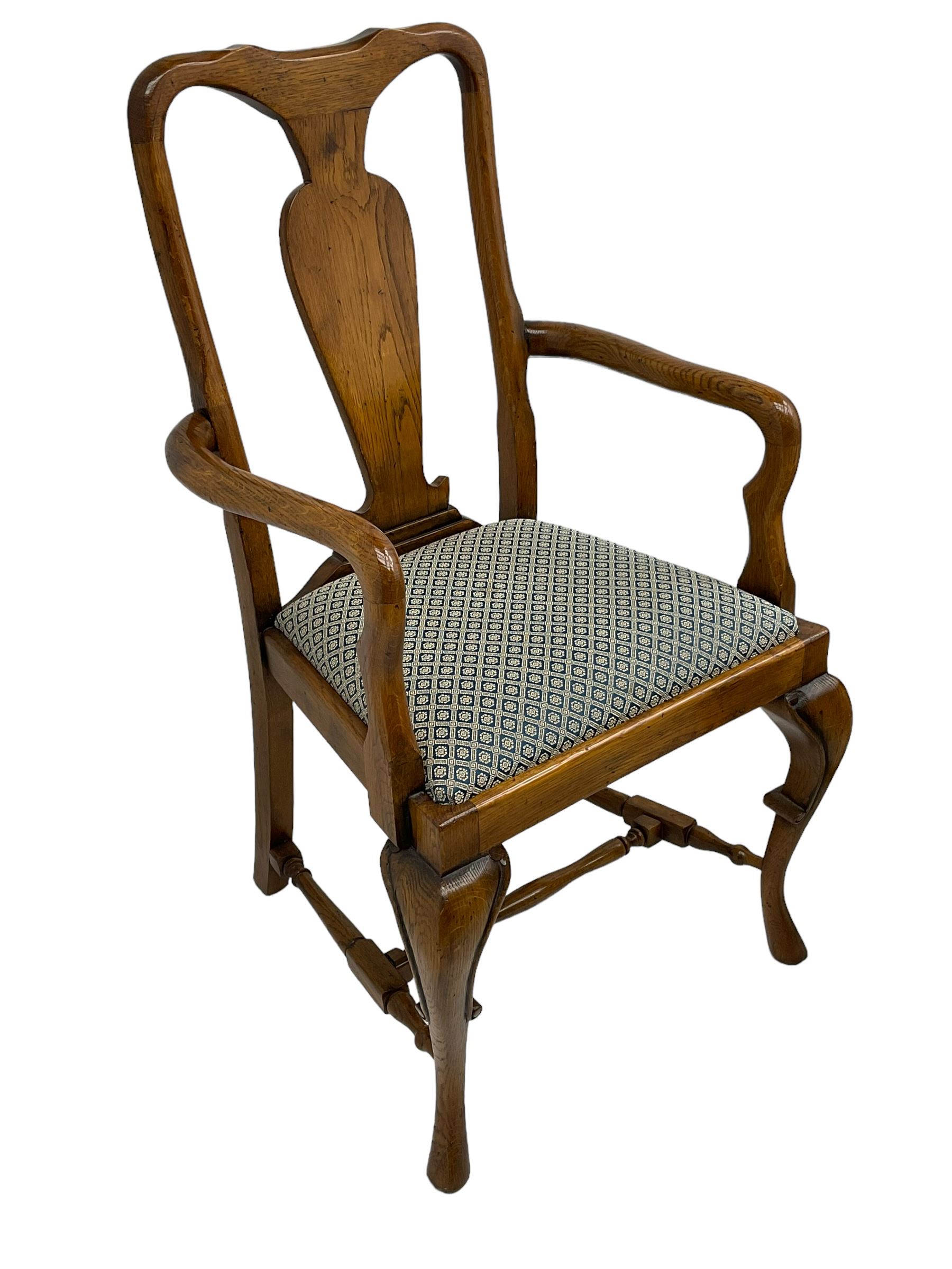 Late 20th century oak dining table, rectangular top with two draw leaf extensions, on turned supports united by moulded hayrake stretchers (180cm - 278cm x 90cm, H76cm); set of eight (6+2) oak dining chairs, shaped cresting rail over shaped splat back, upholster drop-in seat, on cabriole supports united by turned H-shaped stretchers 