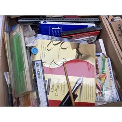 Large collection of calligraphy equipment, including pens, nibs and sets, together with other writing equipment and stationery, in three boxes