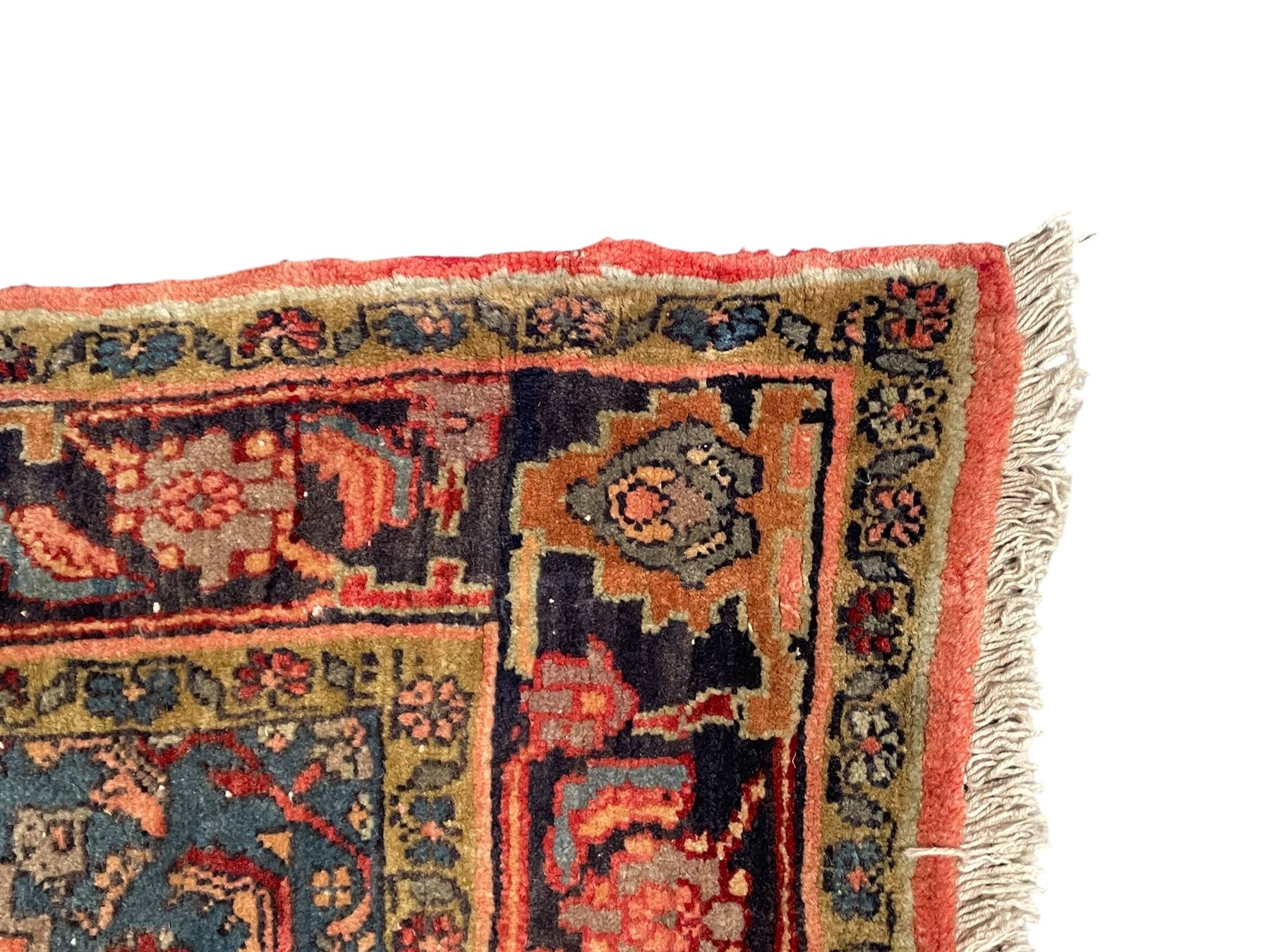 Persian Zanjan pale red ground rug, lozenge medallion and field decorated with floral Herati motifs, the border decorated with stylised plant motifs and trailing branches, floral pattern guard stripes