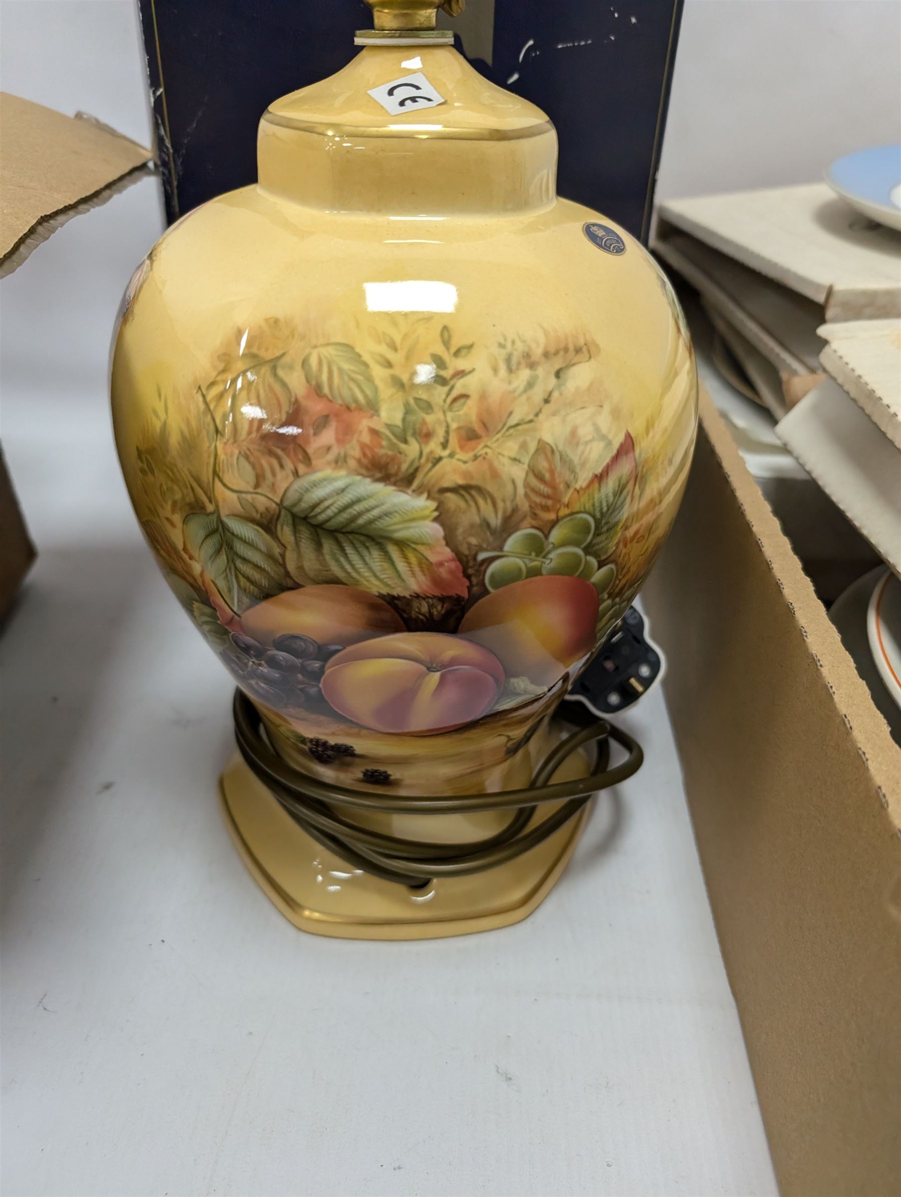 Collection of miniature flower fairy plates, Aynsley Orchard Gold table lamp and other collectors plates