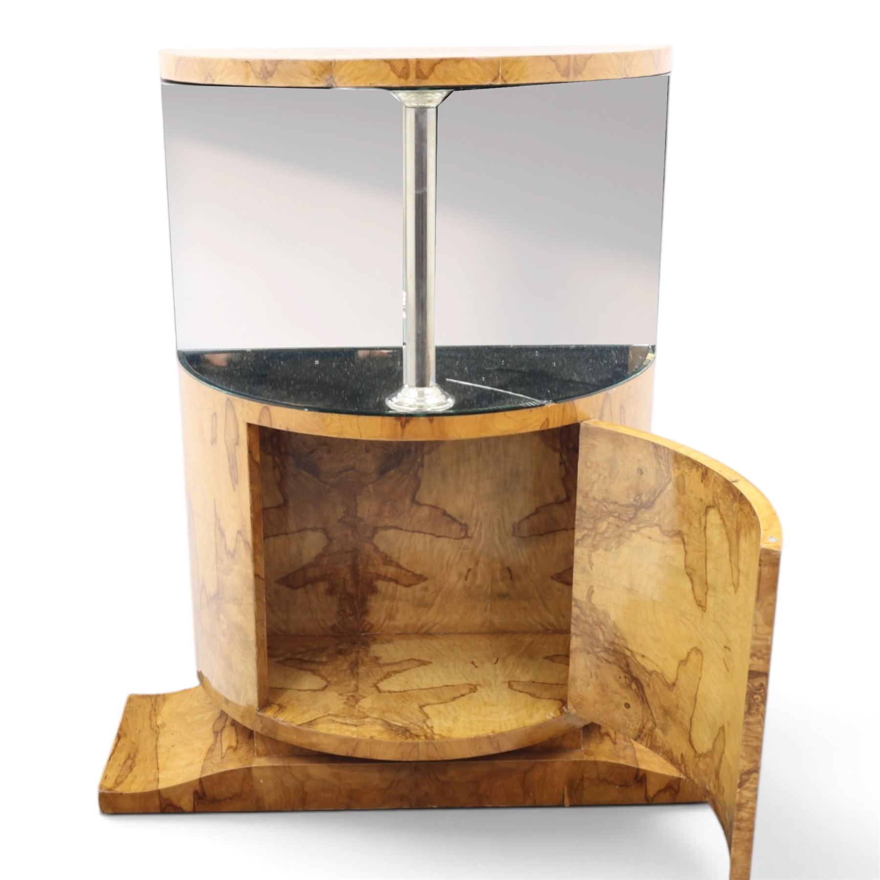 Art Deco figured walnut cocktail cabinet, demi-lune top above mirrored open compartment supported by chrome column, enclosed cupboard below with curved door, on shaped plinth base