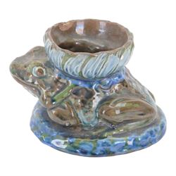 C. H. Brannam pottery Candle holder modelled as a Frog, with  flower upon its back, with s...