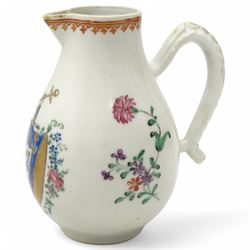 Chinese export Armorial part service decorated with sprays of flowers and a crest of an arm holding an anchor comprising bowl D23cm, pair of octagonal plates 16cm and sparrow beak jug H12cm (4)