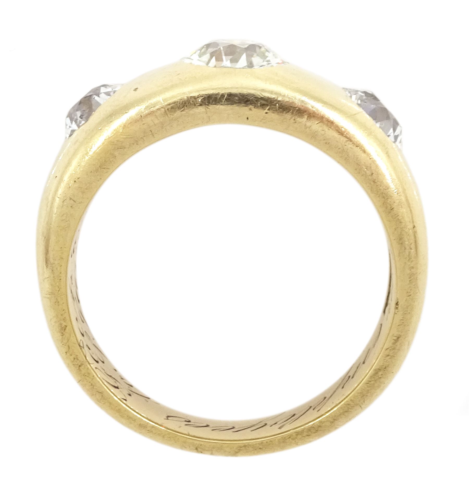 Early 20th century gentleman's gold gypsy set, three stone old cut diamond ring, stamped 18ct, principal diamond approx 1.20 carat, total diamond weight approx 2.50 carat