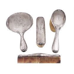 Art Nouveau silver mounted dressing table set, comprising hair brush, hand mirror, clothes brush and comb, all engraved with initials, with textured decoration and embossed whiplash curve borders, hallmarked James Deakin & Sons, Chester  1907