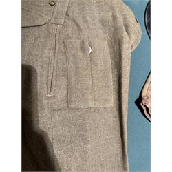 WWII British parachute regiment battle dress uniform, the jacket with shoulder title and Pegasus formation badge to the left arm, shoulder title, Pegasus formation badge and cloth wings to the right, size 3 dated 1943, the trousers size 3 dated 1945 