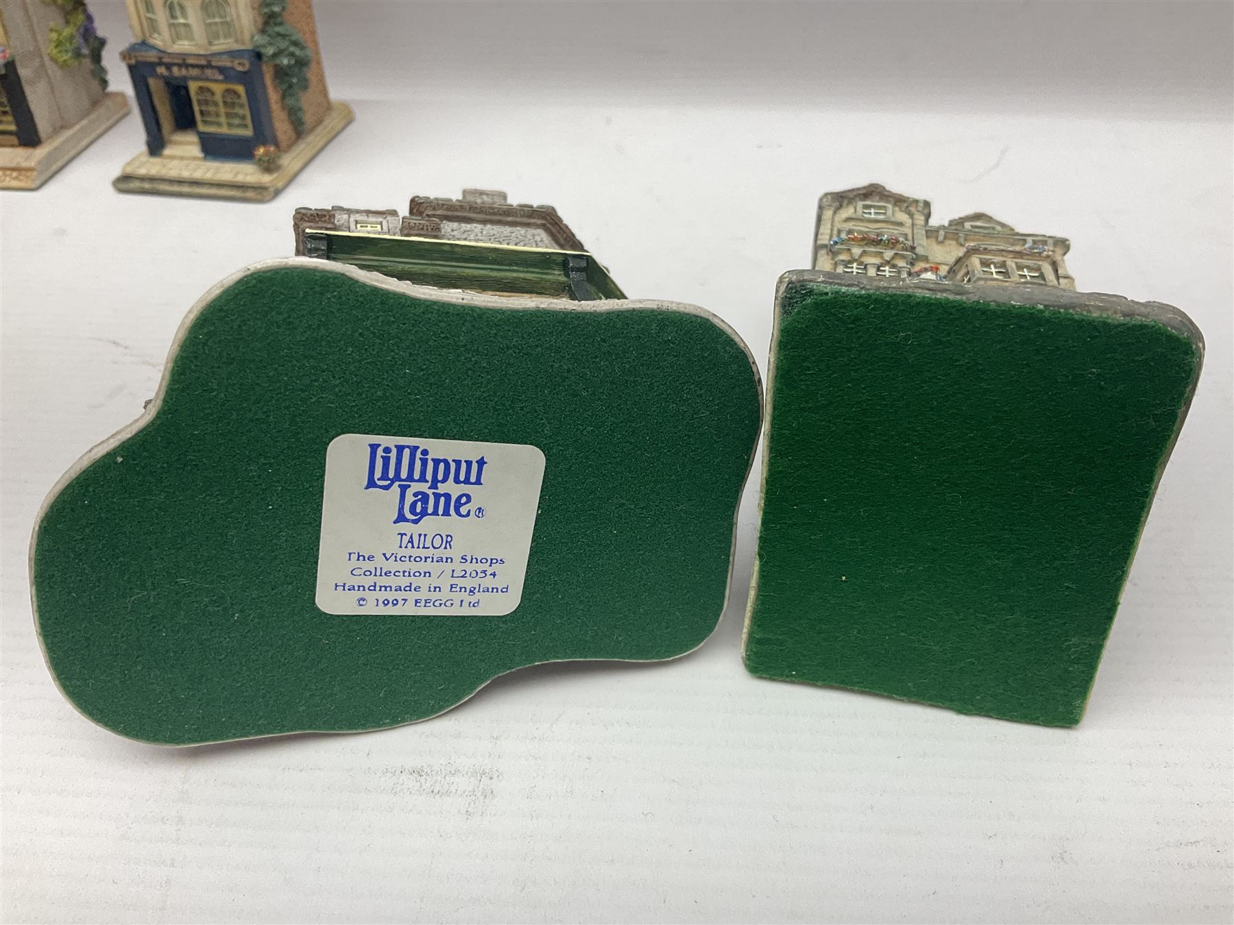 Thirteen Lilliput Lanes from the Shops Collection, including Apothecary, Horologist, China Shop, Penny Sweets, H Samuel etc, all with deeds and original boxes 