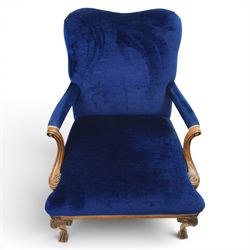 Pair of George II design Gainsborough armchairs in deep blue upholstery, shaped back over scrolled and carved arms, with cabriole supports and carved shell knees terminating in claw on ball feet