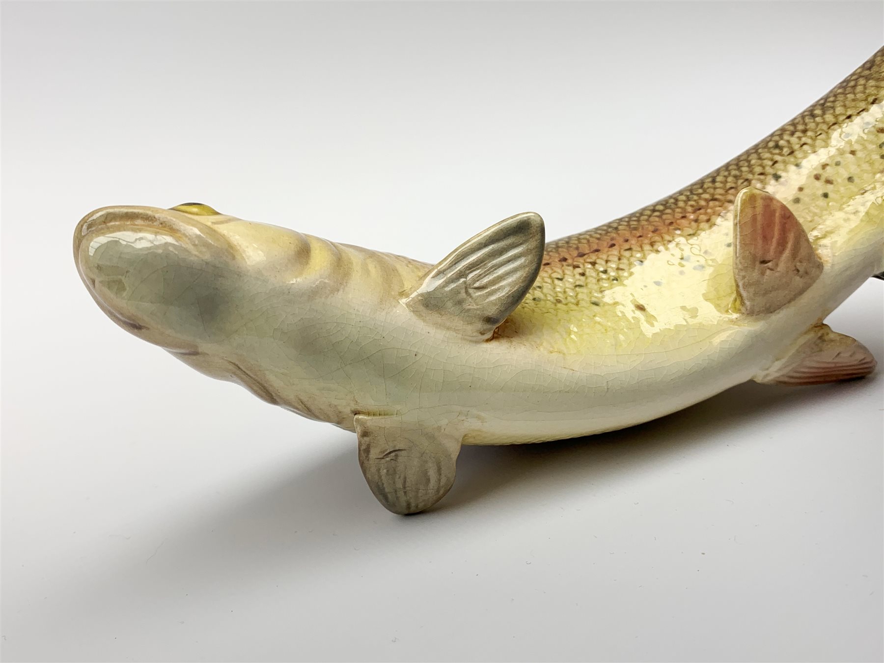 Two Beswick models of fish, Trout 1032 and Atlantic Salmon 1233, each with printed and impressed marks to base, largest H7.5cm. 