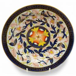 English porcelain Imari tea and coffee wares, pattern 1277, decorated with central orange floral motif surrounded by sprigs of yellow foliage within blue borders, comprising eleven teacups, eight coffee cups, twelve saucers, two shallow bowls and one finger bowl